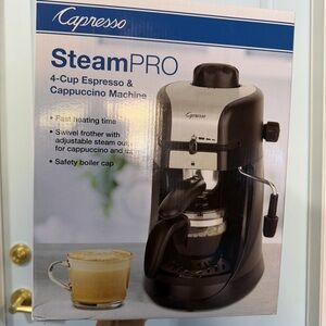 NEW Capresso Steam Pro 4 cup Espresso & Cappuccino Machine NIB coffee maker